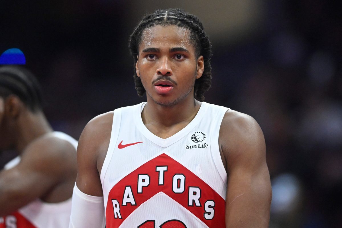 Oct 31, 2025; Cleveland, Ohio, USA; Toronto Raptors forward Collin Murray-Boyles (12) walks on the court in the third quarter against the Cleveland Cavaliers at Rocket Arena. Mandatory Credit: David Richard-Imagn Images