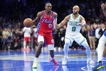 Oct 31, 2025; Philadelphia, Pennsylvania, USA; Philadelphia 76ers guard Tyrese Maxey (0) drives against Boston Celtics guard Derrick White (9) in the fourth quarter at Xfinity Mobile Arena. Mandatory Credit: Kyle Ross-Imagn Images
