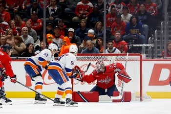 Oct 31, 2025; Washington, District of Columbia, USA; Washington Capitals goaltender Logan Thompson (48) makes a save against on New York Islanders left wing Anders Lee (27) during the third period at Capital One Arena. Mandatory Credit: Geoff Burke-Imagn Images