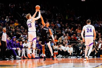 Oct 31, 2025; Phoenix, Arizona, USA; Utah Jazz forward Lauri Markkanen (23) makes a shot over Phoenix Suns forward Ryan Dunn (0) in the second half between the Phoenix Suns and the Utah Jazz at Mortgage Matchup Center. Mandatory Credit: Arianna Grainey-Imagn Images