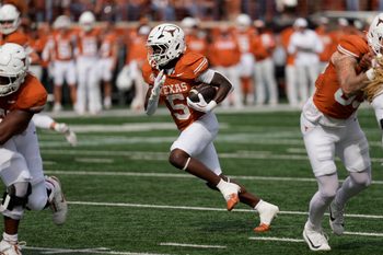 Nov 1, 2025; Austin, Texas, USA; Texas Longhorns running back Quintrevion Wisner (5) runs for a touchdown in the first half against the Vanderbilt Commodores at Darrell K Royal-Texas Memorial Stadium. Mandatory Credit: Scott Wachter-Imagn Images