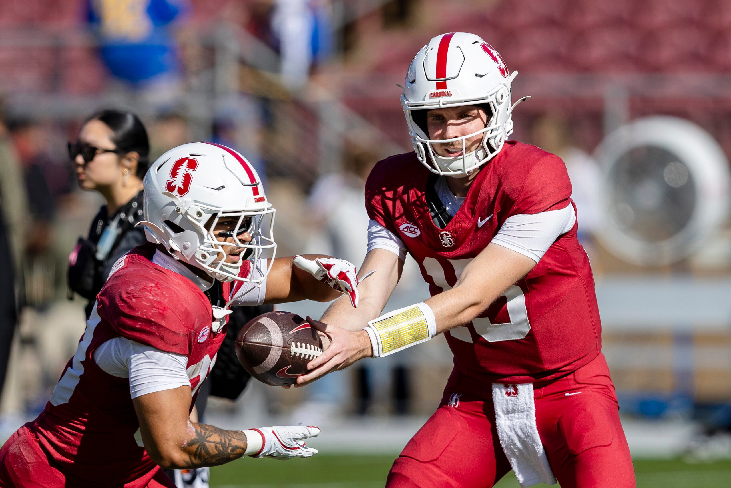 Nov 1, 2025; Stanford, California, USA; Stanford Cardinal quarterback Ben Gulbranson (15) hands off to running back Cole Tabb (33) during warmups before the game against the Pittsburgh Panthers at Stanford Stadium. Mandatory Credit: John Hefti-Imagn Images