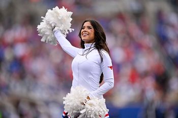 Nov 1, 2025; Dallas, Texas, USA;  The SMU Mustangs cheerleaders perform during the game against the Miami Hurricanes at Gerald J. Ford Stadium. Mandatory Credit: Jerome Miron-Imagn Images