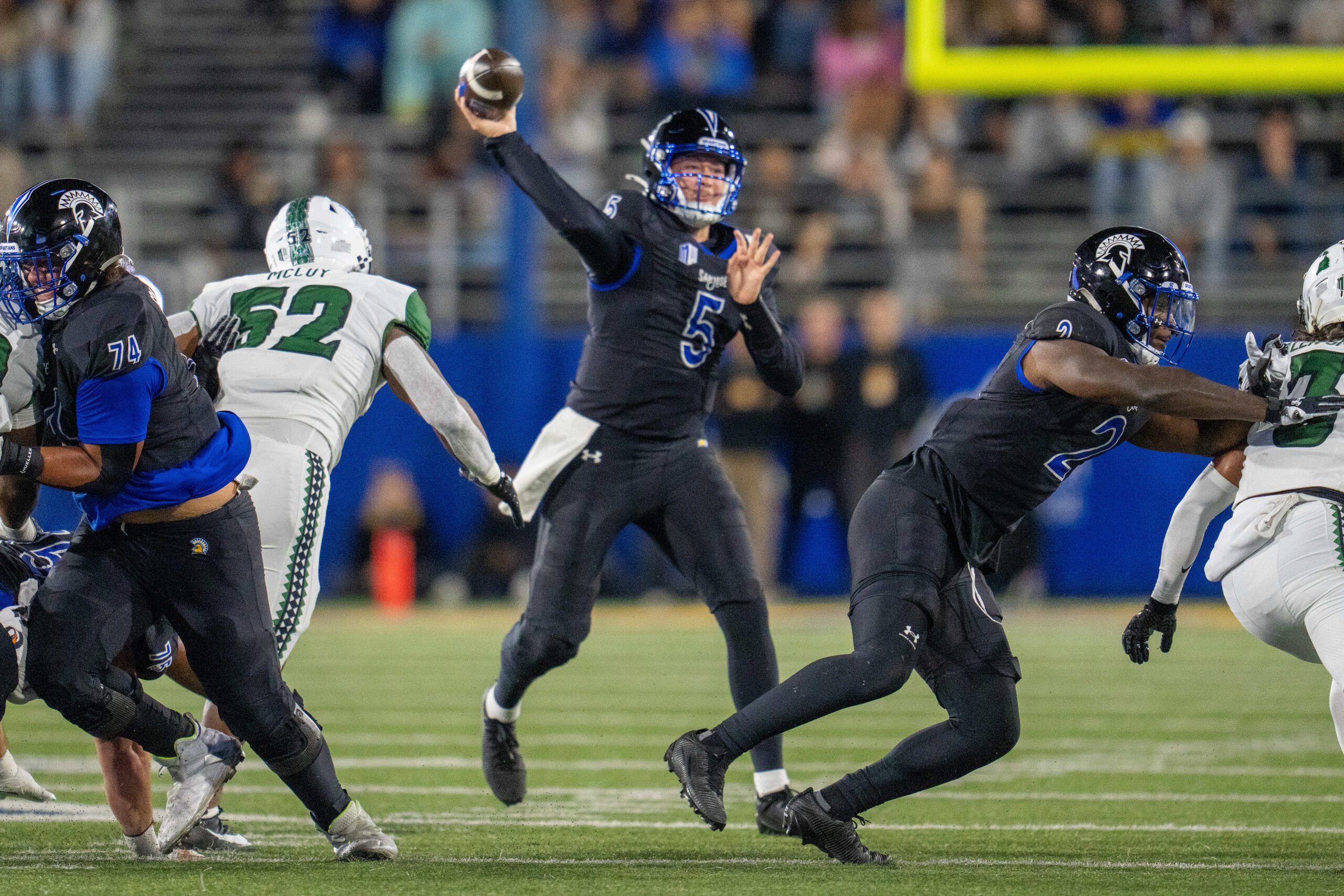 Nov 1, 2025; San Jose, California, USA; San Jose State Spartans quarterback Walker Eget (5) passes the football against the Hawaii Rainbow Wahine during the first quarter at CEFCU Stadium. Mandatory Credit: Neville E. Guard-Imagn Images