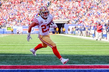 Nov 2, 2025; East Rutherford, New Jersey, USA; San Francisco 49ers running back Christian McCaffrey (23) runs after the catch for a touchdown against the New York Giants during the first half at MetLife Stadium. Mandatory Credit: Ed Mulholland-Imagn Images