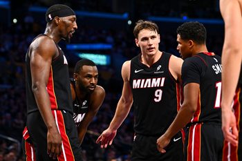 Nov 2, 2025; Los Angeles, California, USA; Miami Heat guard Pelle Larsson (9) meets with teammates during the game against the Los Angeles Lakers during the second half at Crypto.com Arena. Mandatory Credit: Jonathan Hui-Imagn Images