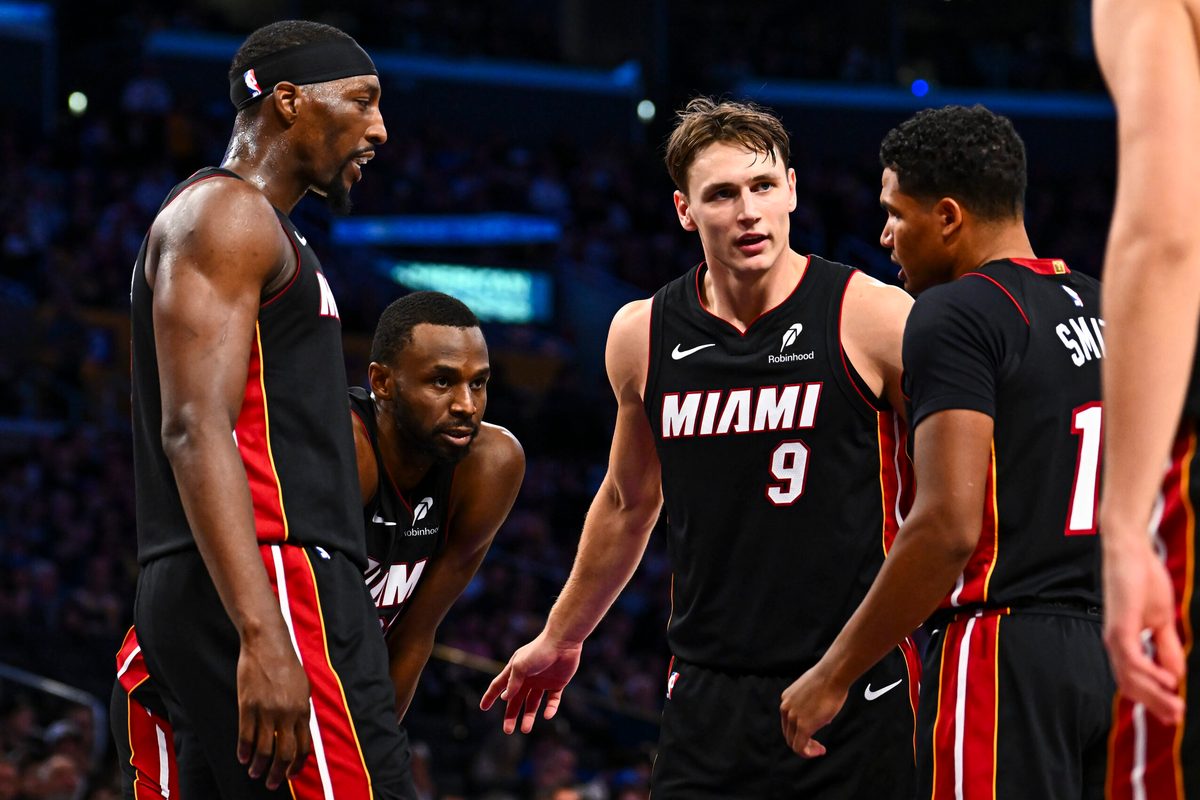Nov 2, 2025; Los Angeles, California, USA; Miami Heat guard Pelle Larsson (9) meets with teammates during the game against the Los Angeles Lakers during the second half at Crypto.com Arena. Mandatory Credit: Jonathan Hui-Imagn Images