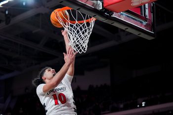 Nov 3, 2025; Cincinnati, Ohio, USA;  Cincinnati Bearcats guard Shon Abaev (10) drives to the basket against the Western Carolina Catamounts in the second half at Fifth Third Arena. Mandatory Credit: Aaron Doster-Imagn Images