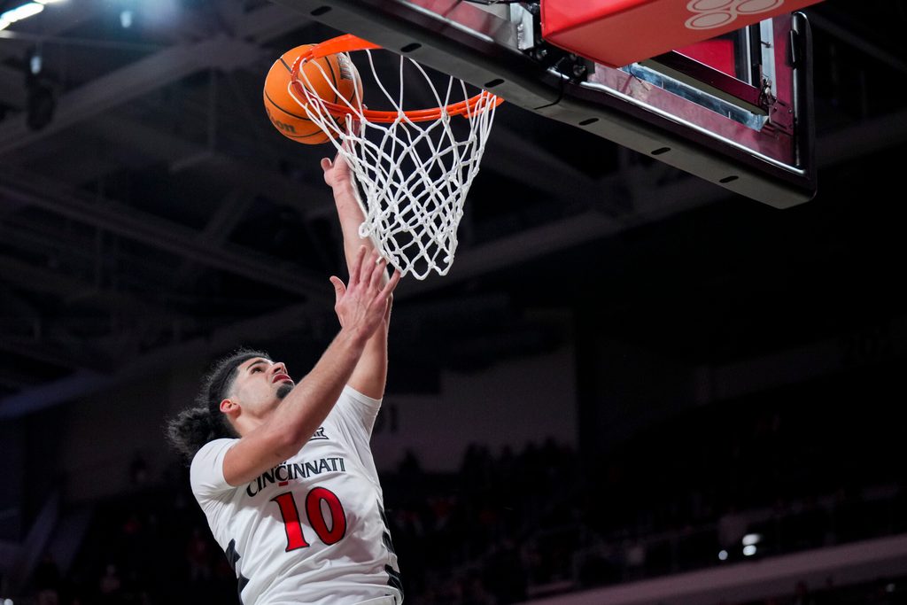 Nov 3, 2025; Cincinnati, Ohio, USA; Cincinnati Bearcats guard Shon Abaev (10) drives to the basket against the Western Carolina Catamounts in the second half at Fifth Third Arena. Mandatory Credit: Aaron Doster-Imagn Images
