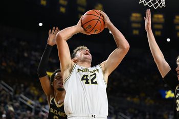 Nov 3, 2025; Ann Arbor, Michigan, USA; Michigan Wolverines forward Will Tschetter (42) drives against the Oakland Golden Grizzlies in the first half at Crisler Center. Mandatory Credit: Lon Horwedel-Imagn Images
