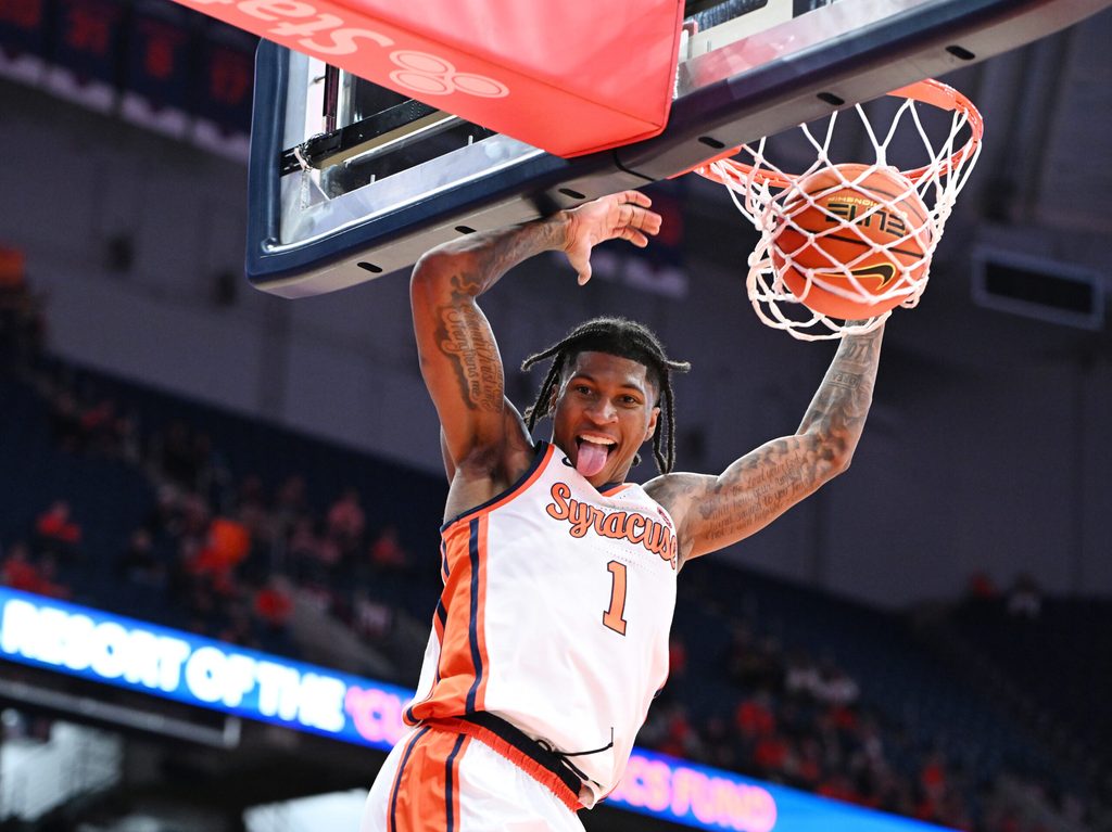 Nov 3, 2025; Syracuse, New York, USA; Syracuse Orange forward Donnie Freeman (1) dunks the ball in the second half against the Binghamton Bearcats at the JMA Wireless Dome. Mandatory Credit: Mark Konezny-Imagn Images