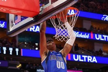 Nov 3, 2025; Houston, Texas, USA; Dallas Mavericks guard Max Christie (00) dunks against the Houston Rockets in the fourth quarter at Toyota Center. Mandatory Credit: Thomas Shea-Imagn Images