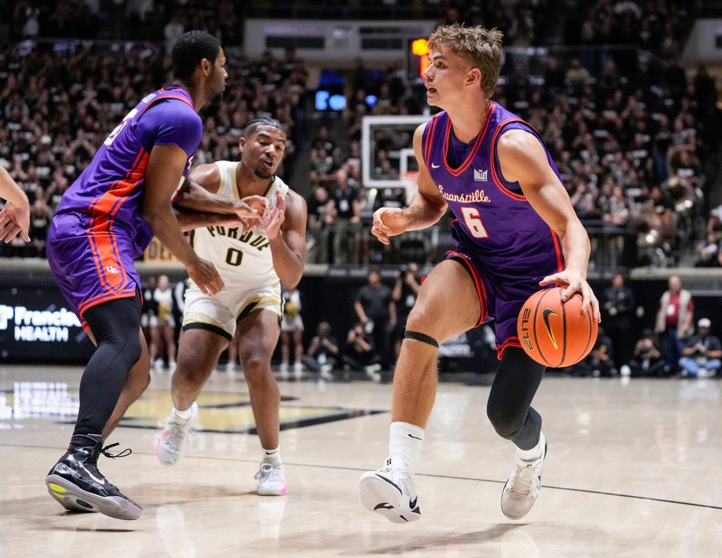Evansville Purple Aces guard Leif Moeller (6) rushes up the court Tuesday, Nov. 4, 2025, during the game at Mackey Arena in West Lafayette. The Purdue Boilermakers defeated the Evansville Purple Aces, 82-51.