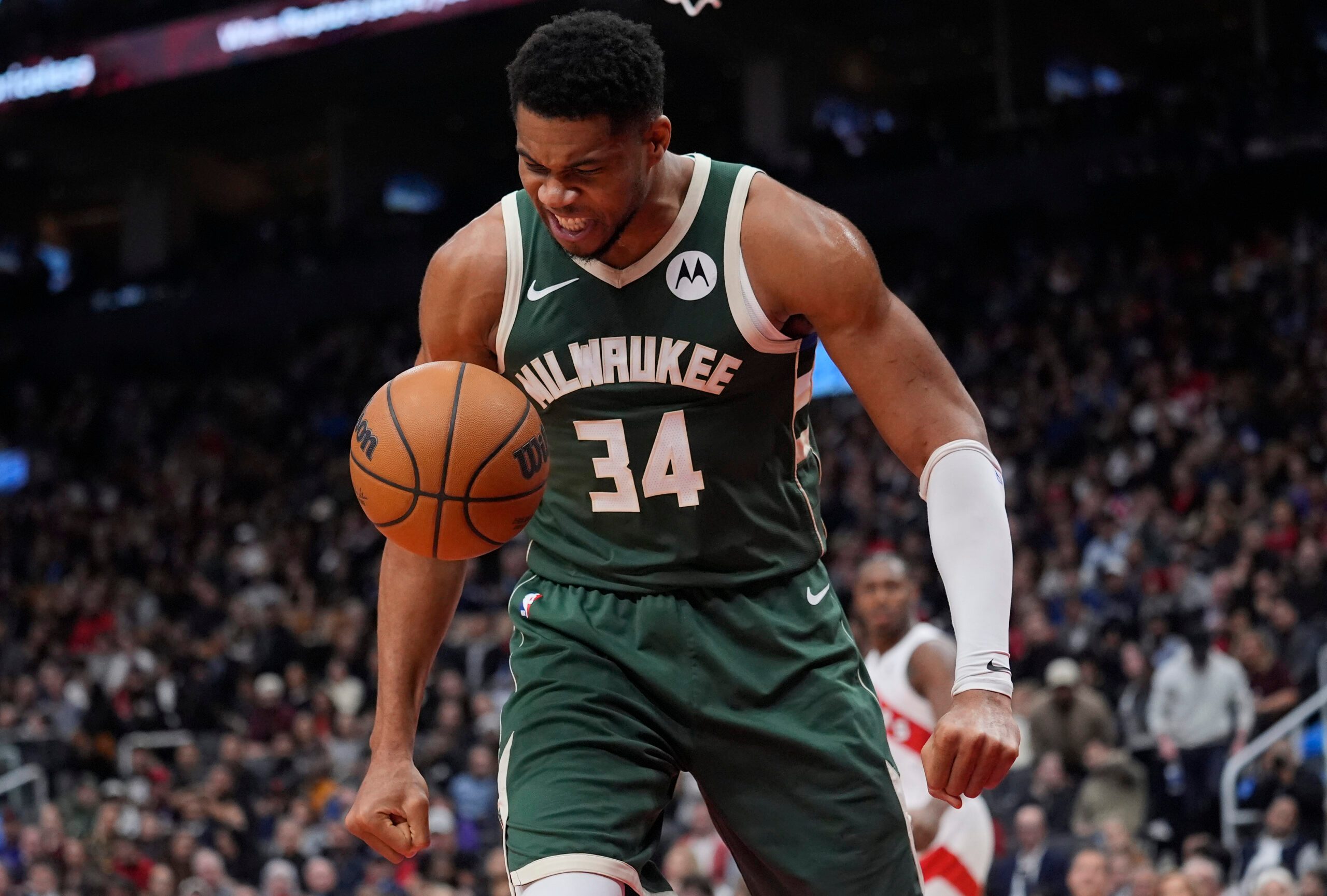 Nov 4, 2025; Toronto, Ontario, CAN; Milwaukee Bucks forward Giannis Antetokounmpo (34) reacts after making a basket against the Toronto Raptors during the first half at Scotiabank Arena. Mandatory Credit: John E. Sokolowski-Imagn Images