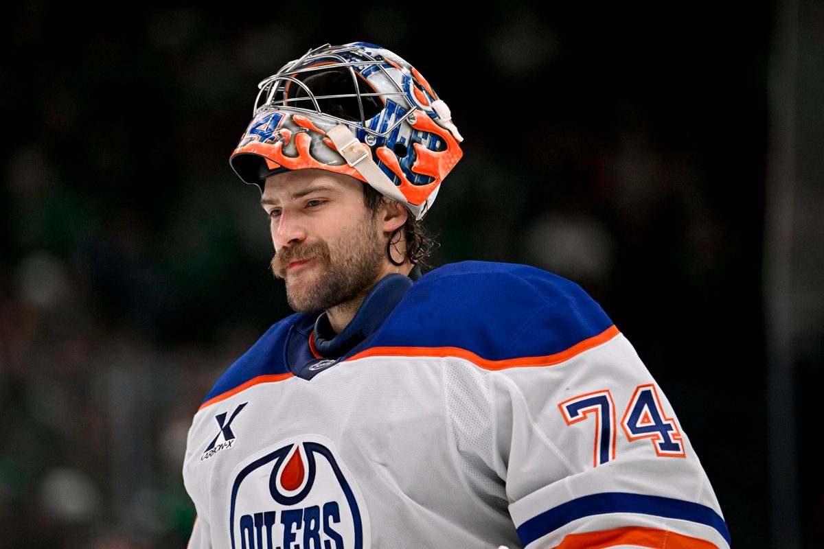 Nov 4, 2025; Dallas, Texas, USA; Edmonton Oilers goaltender Stuart Skinner (74) skates back on the ice during the overtime period against the Dallas Stars at the American Airlines Center. Mandatory Credit: Jerome Miron-Imagn Images