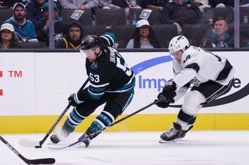 Oct 28, 2025; San Jose, California, USA; San Jose Sharks left wing Jeff Skinner (53) eludes Los Angeles Kings right winger Alex Laferriere (14) in the third period at SAP Center at San Jose. Mandatory Credit: David Gonzales-Imagn Images