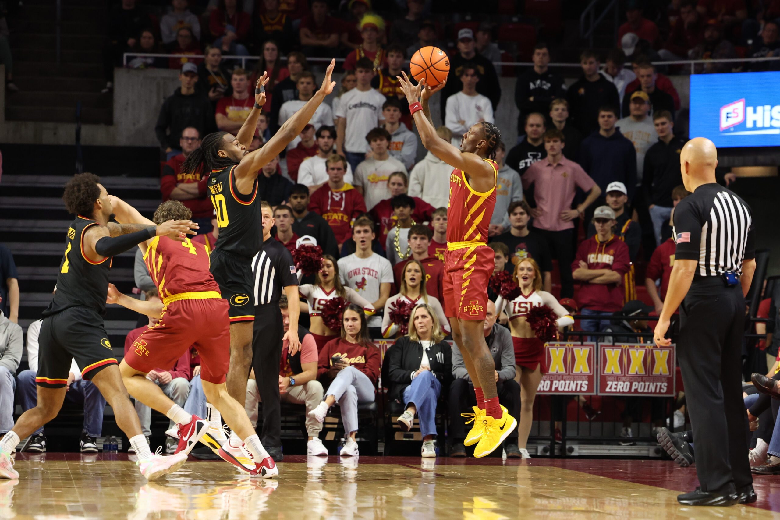 Nov 6, 2025; Ames, Iowa, USA; Grambling State Tigers forward Richard Amaefule (10) defends the shot from Iowa State Cyclones guard Jamarion Batemon (1) during the second half at James H. Hilton Coliseum. Mandatory Credit: Reese Strickland-Imagn Images