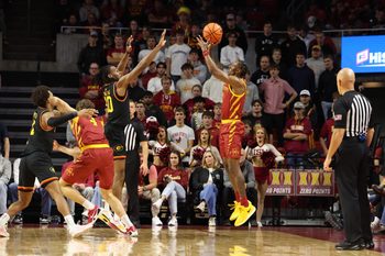 Nov 6, 2025; Ames, Iowa, USA; Grambling State Tigers forward Richard Amaefule (10) defends the shot from Iowa State Cyclones guard Jamarion Batemon (1) during the second half at James H. Hilton Coliseum. Mandatory Credit: Reese Strickland-Imagn Images