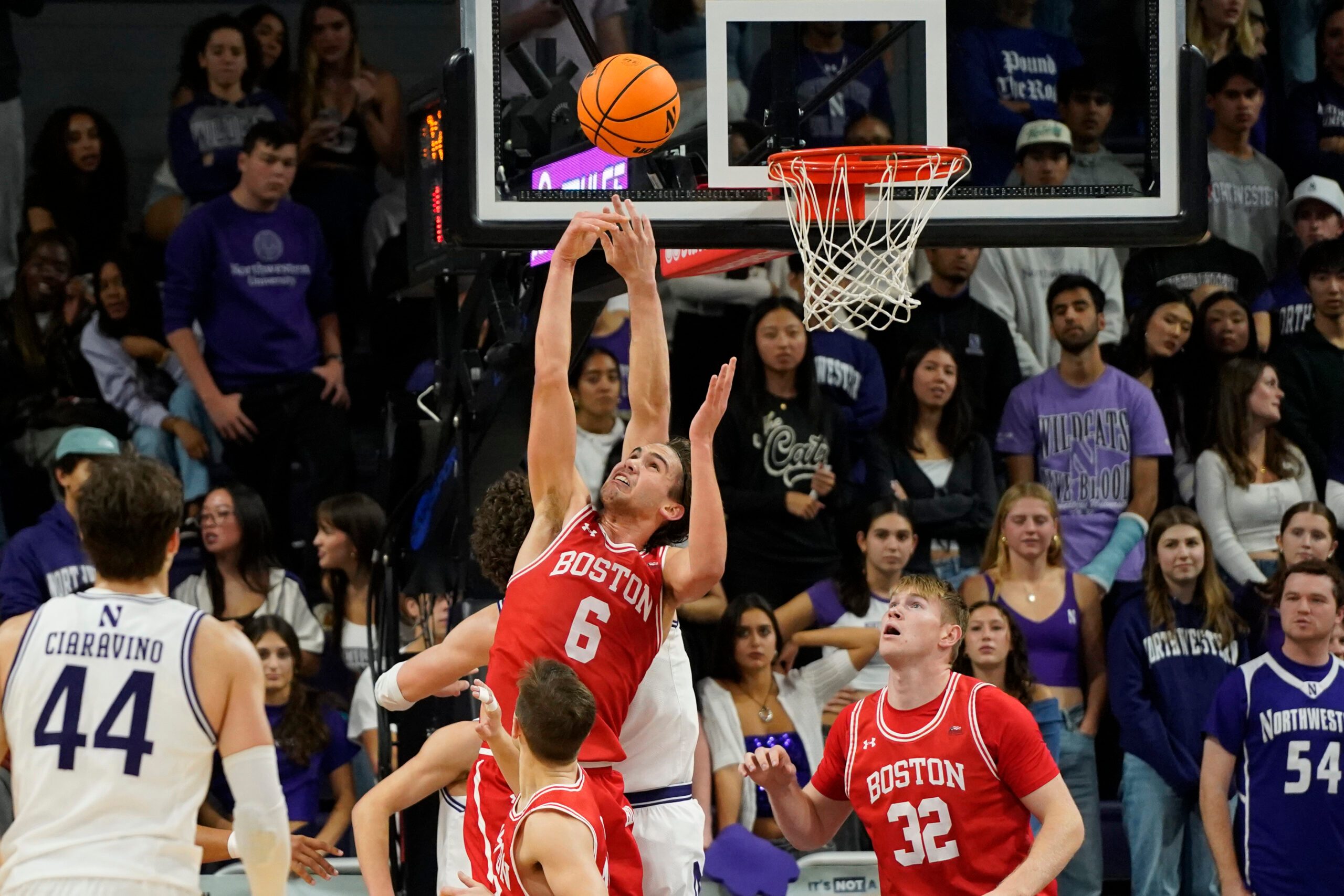 Nov 7, 2025; Evanston, Illinois, USA; Boston University Terriers guard Sam Hughes (6) grabs a rebound against the Northwestern Wildcats during the second half at Welsh-Ryan Arena. Mandatory Credit: David Banks-Imagn Images
