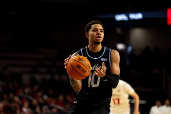 Georgia State Panthers guard Jelani Hamilton (10) grabs a rebound in the second half of the NCAA basketball game against the Cincinnati Bearcats at Fifth Third Arena in Cincinnati on Nov. 7, 2025.