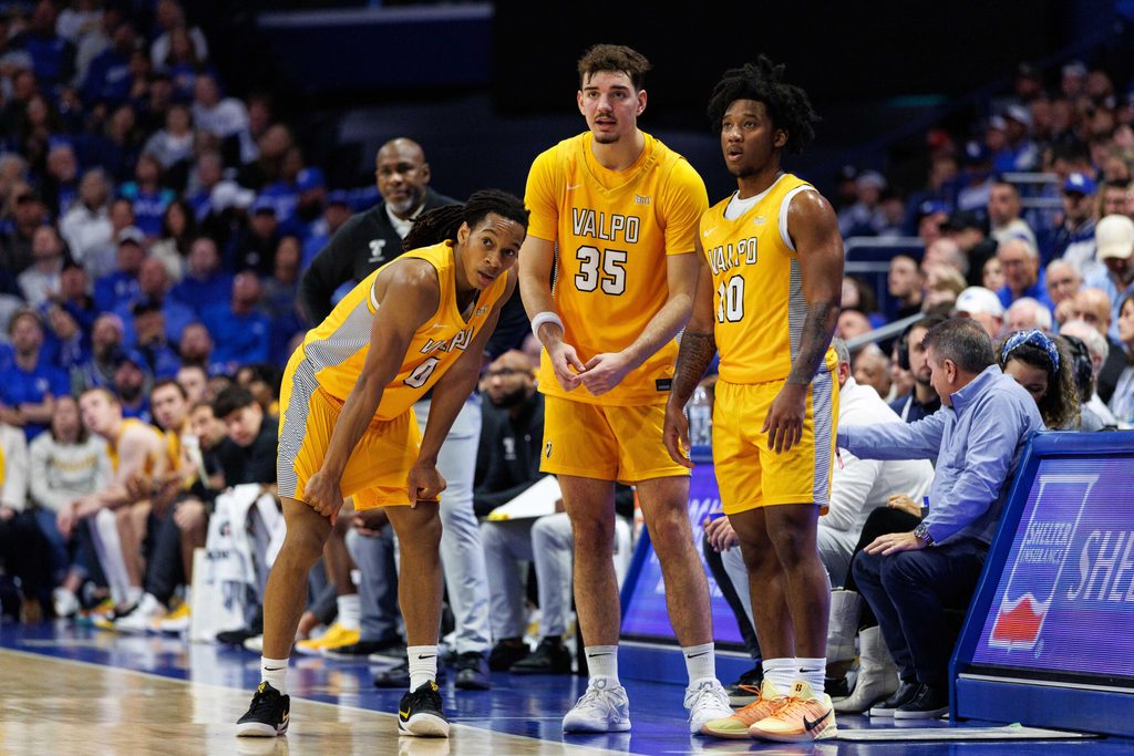Nov 7, 2025; Lexington, Kentucky, USA; Valparaiso Beacons guard Rakim Chaney (0), center Tucker Tornatta (35) and guard Mark Brown (10) wait to check into the game during the second half against the Kentucky Wildcats at Rupp Arena at Central Bank Center. Mandatory Credit: Jordan Prather-Imagn Images