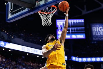 Nov 7, 2025; Lexington, Kentucky, USA; Valparaiso Beacons forward JT Pettigrew (7) goes to the basket during the first half against the Kentucky Wildcats at Rupp Arena at Central Bank Center. Mandatory Credit: Jordan Prather-Imagn Images