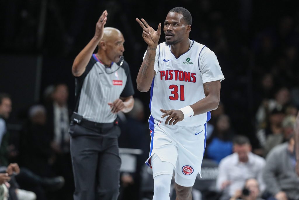 Nov 7, 2025; Brooklyn, New York, USA; Detroit Pistons guard Javonte Green (31) celebrates after making a three point shot in the fourth quarter against the Brooklyn Nets at Barclays Center. Mandatory Credit: Wendell Cruz-Imagn Images