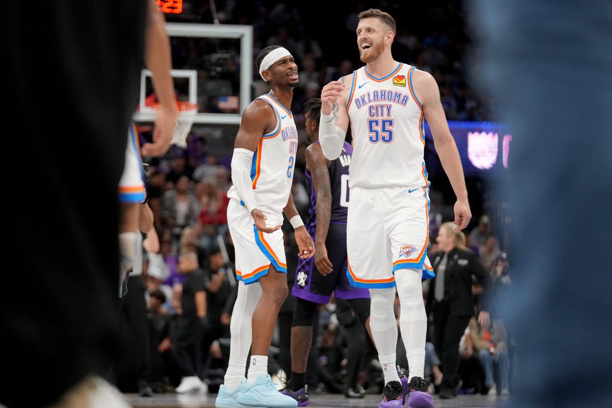 Nov 7, 2025; Sacramento, California, USA; Oklahoma City Thunder guard Shai Gilgeous-Alexander (2) meets with center Isiah Hartenstein (55) after a play against the Sacramento Kings in the third quarter at the Golden 1 Center. Mandatory Credit: Cary Edmondson-Imagn Images
