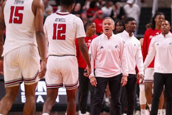 Texas Tech head coach Grant McCasland talks to his players during a timeout in a nonconference men's basketball game, Friday, Nov. 7, 2025, at United Supermarkets Arena.