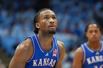 Nov 7, 2025; Chapel Hill, North Carolina, USA;  Kansas Jayhawks guard Darryn Peterson (22) at the free throw line in the first half at Dean E. Smith Center. Mandatory Credit: Bob Donnan-Imagn Images