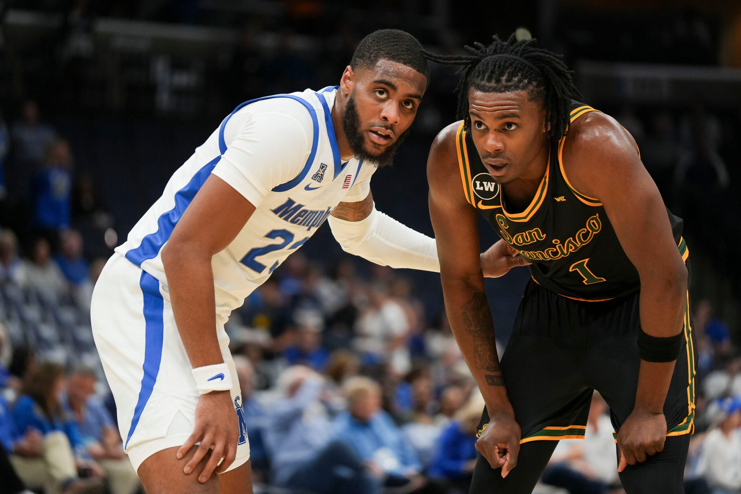 Memphis' Sincere Parker (23) guards San Franciso's Mookie Cook (1) on the inbound during the season opener for the Memphis Tigers versus San Francisco in FedExForum, Memphis, Tenn., on Saturday, Nov. 8, 2025.