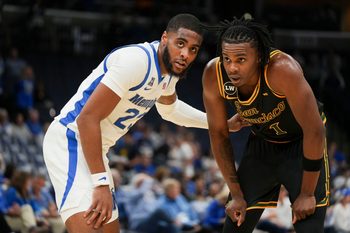Memphis' Sincere Parker (23) guards San Franciso's Mookie Cook (1) on the inbound during the season opener for the Memphis Tigers versus San Francisco in FedExForum, Memphis, Tenn., on Saturday, Nov. 8, 2025.