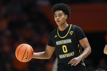 Nov 8, 2025; Knoxville, Tennessee, USA;  Northern Kentucky Norse guard Dan Gherezgher (0) brings the ball upcourt against the Tennessee Volunteers at Thompson-Boling Arena at Food City Center. Mandatory Credit: Randy Sartin-Imagn Images