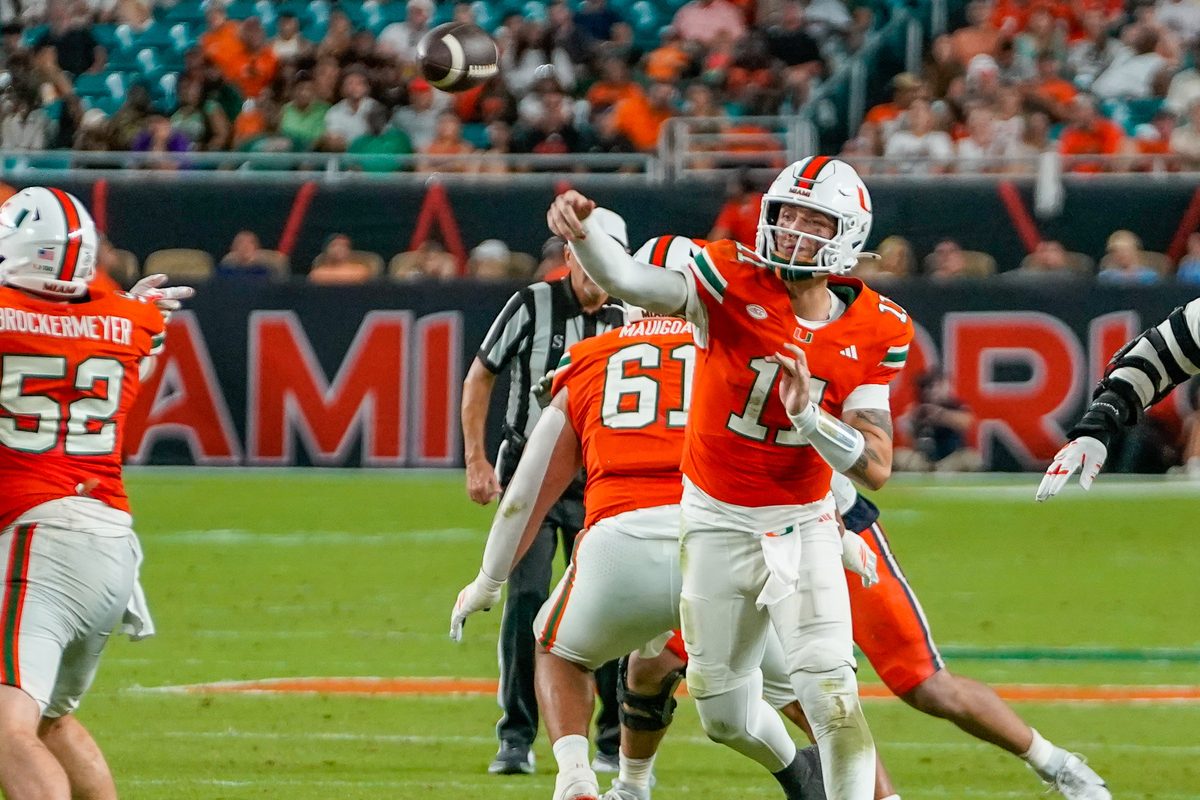 Nov 8, 2025; Miami Gardens, Florida, USA; Miami Hurricanes quarterback Carson Beck (11) throws a pass against the Syracuse Orange during the third quarter at Hard Rock Stadium. Mandatory Credit: Jeff Romance-Imagn Images