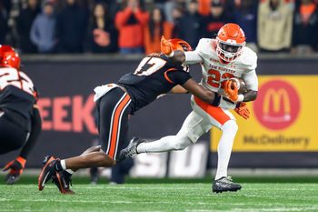 Nov 8, 2025; Corvallis, Oregon, USA; Oregon State Beavers defensive back Skyler Thomas (17) tackles Sam Houston Bearkats running back Alton McCaskill (22) after a short gain during the third quarter at Reser Stadium. Mandatory Credit: Craig Strobeck-Imagn Images