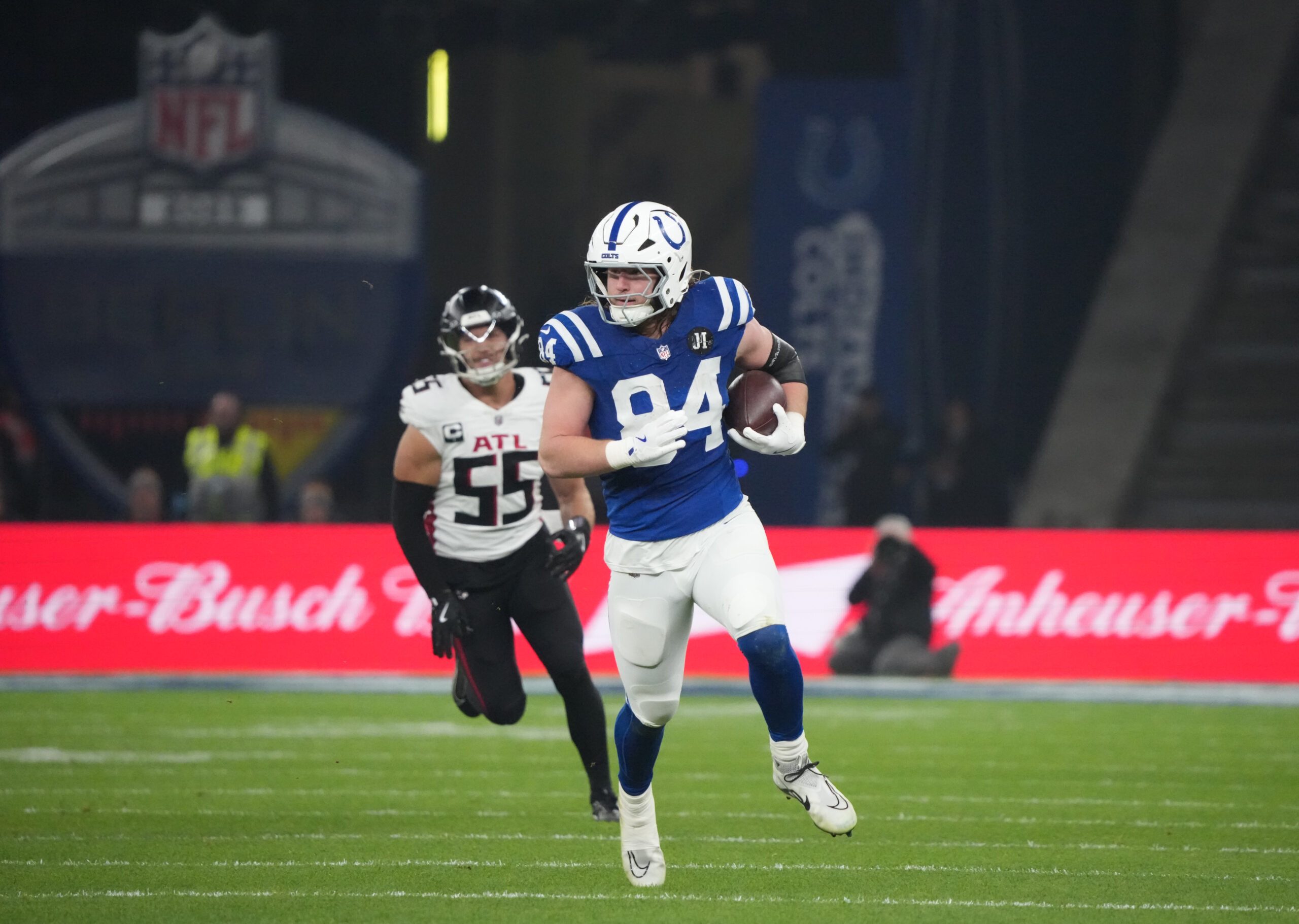 Nov 9, 2025; Berlin, Germany; Indianapolis Colts tight end Tyler Warren (84) runs after a catch against the Atlanta Falcons during the NFL Berlin Game at Olympic Stadium. Mandatory Credit: Kirby Lee-Imagn Images