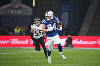 Nov 9, 2025; Berlin, Germany; Indianapolis Colts tight end Tyler Warren (84) runs after a catch against the Atlanta Falcons during the NFL Berlin Game at Olympic Stadium. Mandatory Credit: Kirby Lee-Imagn Images