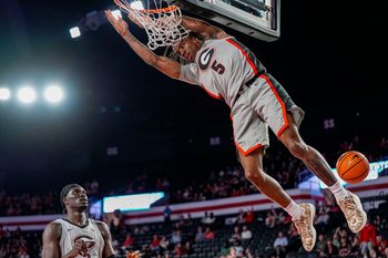 Nov 9, 2025; Athens, Georgia, USA; Georgia Bulldogs guard Jeremiah Wilkinson (5) dunks the ball against the Morehead State Eagles during the first half at Stegeman Coliseum. Mandatory Credit: Dale Zanine-Imagn Images