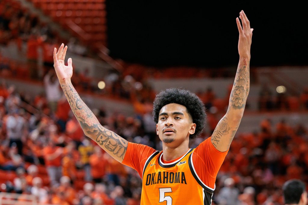 Nov 9, 2025; Stillwater, Oklahoma, USA; Oklahoma State Cowboys guard Vyctorius Miller (5) reacts to a play during the second half against the Texas A&M Aggies at Gallagher-Iba Arena. Mandatory Credit: William Purnell-Imagn Images