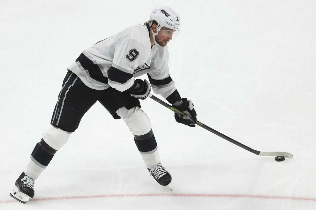Nov 9, 2025; Pittsburgh, Pennsylvania, USA; Los Angeles Kings right wing Adrian Kempe (9) shoots the puck against the Pittsburgh Penguins during the third period at PPG Paints Arena. Mandatory Credit: Charles LeClaire-Imagn Images