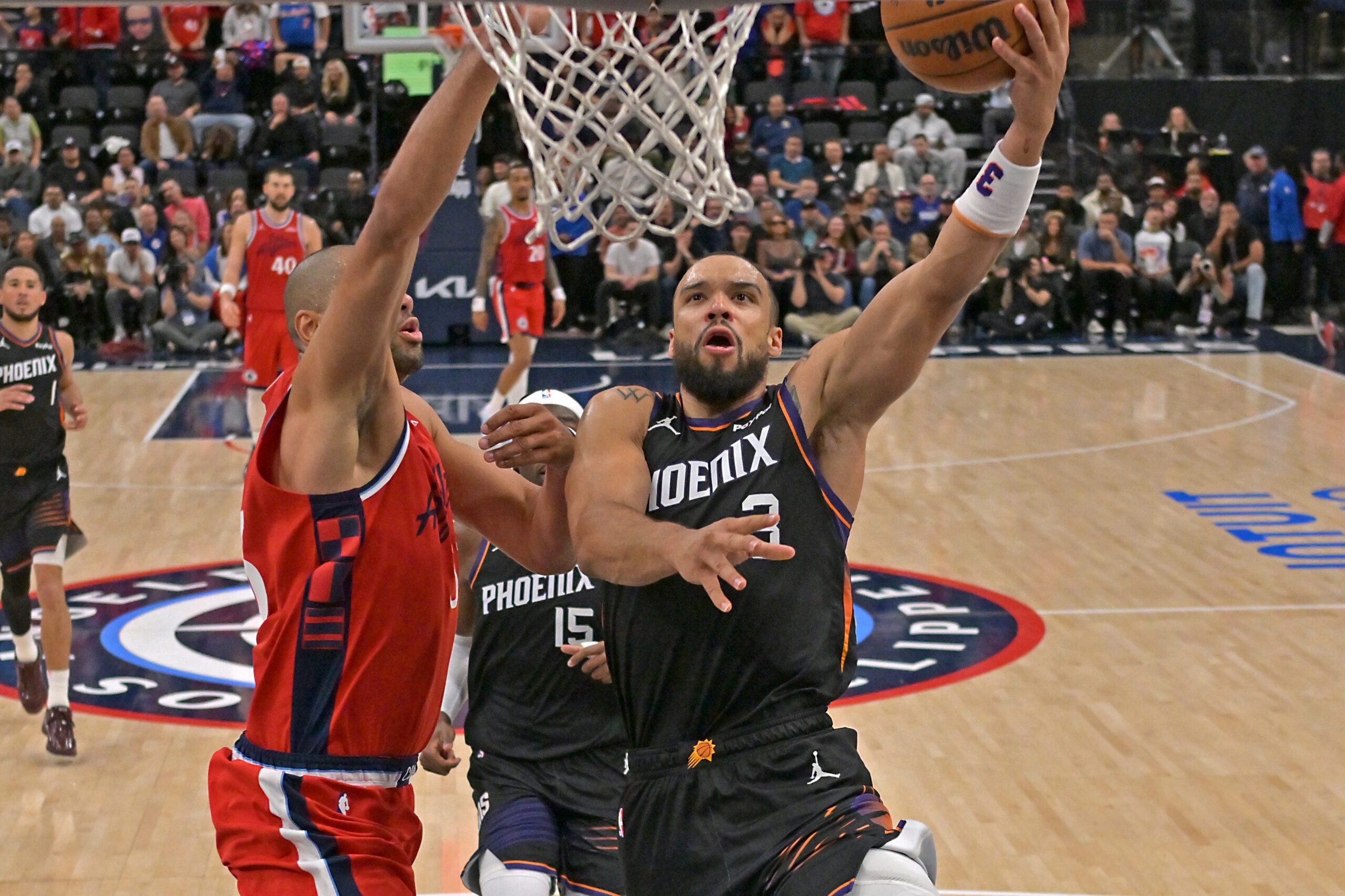 Nov 8, 2025; Inglewood, California, USA;  Phoenix Suns forward Dillon Brooks (3) is defended by Los Angeles Clippers forward Nicolas Batum (33) during the second half at Intuit Dome. Mandatory Credit: Jayne Kamin-Oncea-Imagn Images