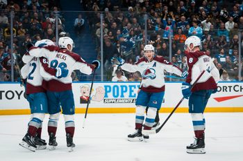 Nov 9, 2025; Vancouver, British Columbia, CAN; Colorado Avalanche forward Artturi Lehkonen (62) and forward Martin Necas (88) and forward Nathan MacKinnon (29) and defenseman Cale Makar (8) celebrate Lehkonen’s second gaol of the game against the Vancouver Canucks in the third period at Rogers Arena. Mandatory Credit: Bob Frid-Imagn Images