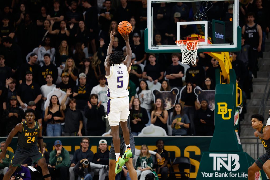 Nov 9, 2025; Waco, Texas, USA; Washington Huskies guard Zoom Diallo (5) scores a basket against the Baylor Bears during the second half at Paul and Alejandra Foster Pavilion. Mandatory Credit: Chris Jones-Imagn Images