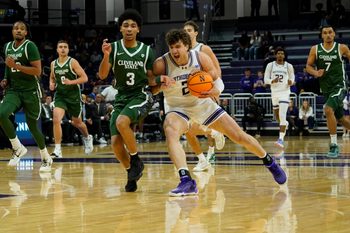 Nov 10, 2025; Evanston, Illinois, USA; Cleveland State Vikings guard Tre Beard (3) defends Northwestern Wildcats forward Nick Martinelli (2) during the second half at Welsh-Ryan Arena. Mandatory Credit: David Banks-Imagn Images
