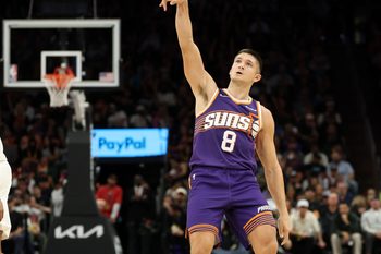Nov 10, 2025; Phoenix, Arizona, USA; Phoenix Suns guard Grayson Allen (8) shoots a three pointer against the New Orleans Pelicans in the second half at the Mortgage Matchup Center. Mandatory Credit: Mark J. Rebilas-Imagn Images