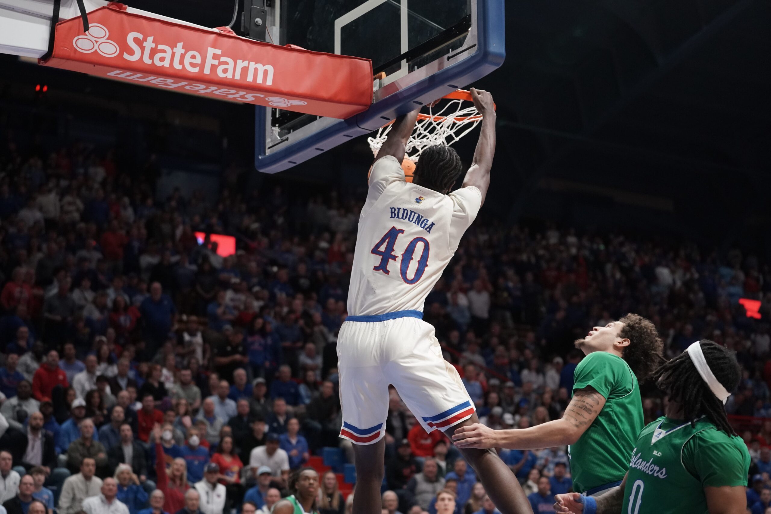 Kansas Jayhawks forward Flory Bidunga (40) dunks the ball during the first half of the game against Texas A&M-Corpus Christi Islanders inside Allen Fieldhouse on Nov. 11, 2025.