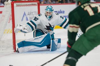 Nov 11, 2025; Saint Paul, Minnesota, USA; San Jose Sharks goaltender Yaroslav Askarov (30) prepares for a shot from Minnesota Wild left wing Marcus Foligno (17) in the second period at Grand Casino Arena. Mandatory Credit: Matt Blewett-Imagn Images