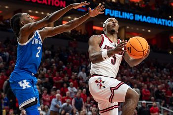 Louisville Cardinals guard Ryan Conwell (3) drove to the basket during the second half as the Louisville Cardinals hosted the Kentucky Wildcats at the KFC Yum! Center on Tuesday, Nov. 11, 2025. The Cardinals defeated the Wildcats 96-88.