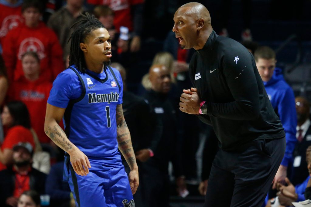 Nov 11, 2025; Oxford, Mississippi, USA; Memphis Tigers head coach Penny Hardaway talks with Memphis Tigers guard Dug McDaniel (1) during the second half against the Mississippi Rebels at The Sandy and John Black Pavilion at Ole Miss. Mandatory Credit: Petre Thomas-Imagn Images