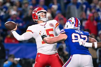 Nov 2, 2025; Orchard Park, New York, USA; Kansas City Chiefs quarterback Patrick Mahomes (15) throws a pass under pressure from Buffalo Bills defensive end Joey Bosa (97) in the fourth quarter at Highmark Stadium. Mandatory Credit: Mark Konezny-Imagn Images